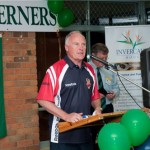 Rodney Hogg at podium Stan in bgrnd - Launch function